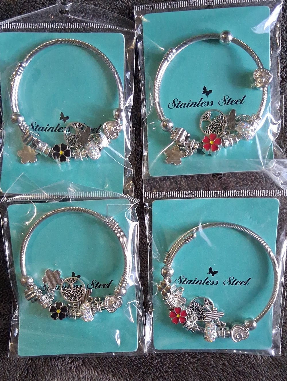 PICK ONE.Women's Charm Bangle Bracelet - Silver with Red & Black Flower Accents.